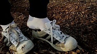 Playing on the Swing with Adidas Superstars and water